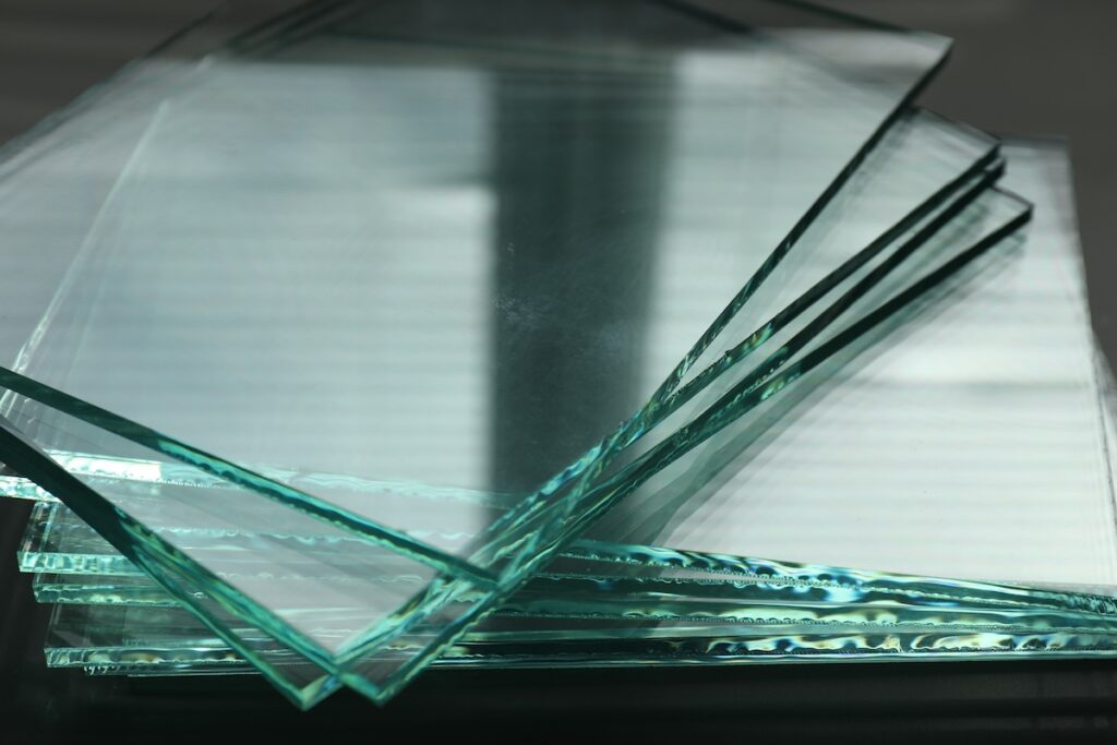 Stack of glass sheets on a table in a close-up view